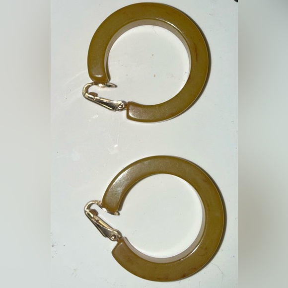 Authentic tested Bakelite clip on earrings! Simichrome test photo shown. EUC